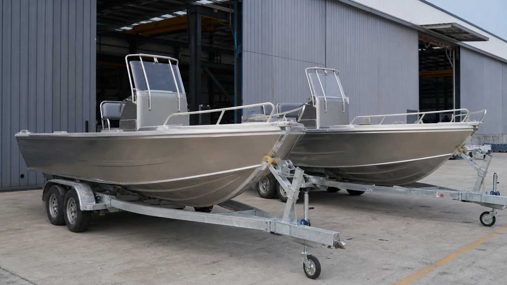 Unbranded aluminum fishing boats prepared for dealer procurement review